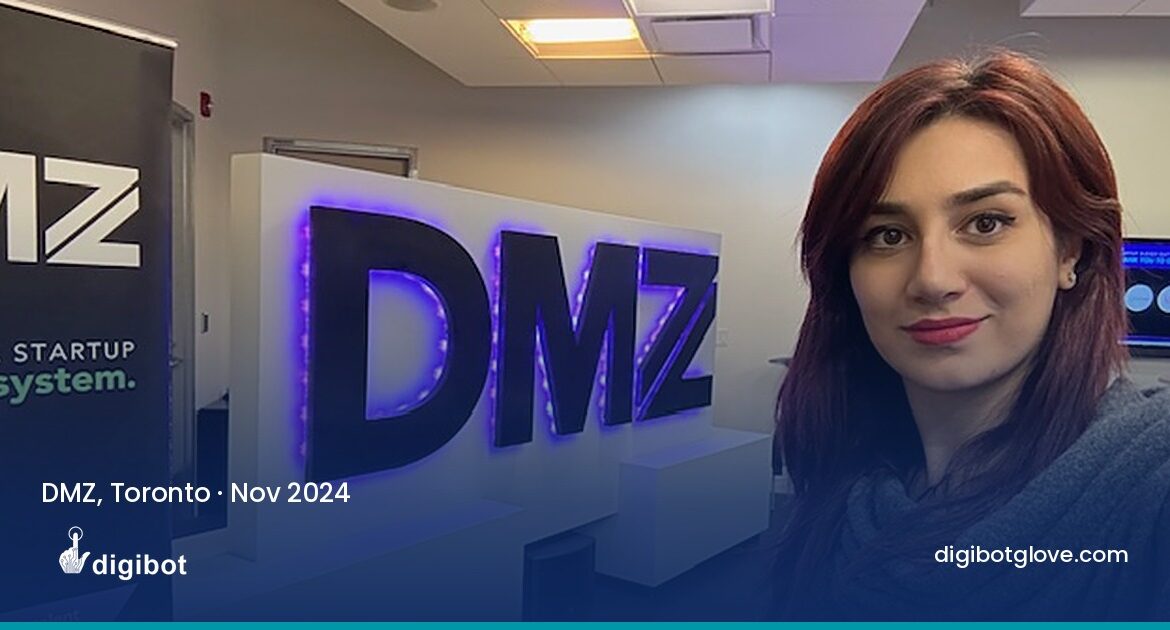 Elham Mozaffari in front of the DMZ sign at the DMZ startup incubator in Toronto, November 2024